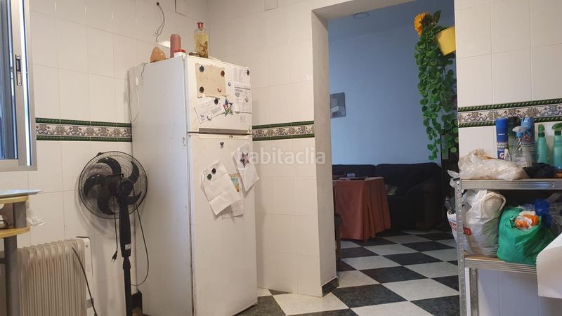 Foto b50e1212-6329-46c3-8903-ed33ff17aa04. Casa adossada a Pilas