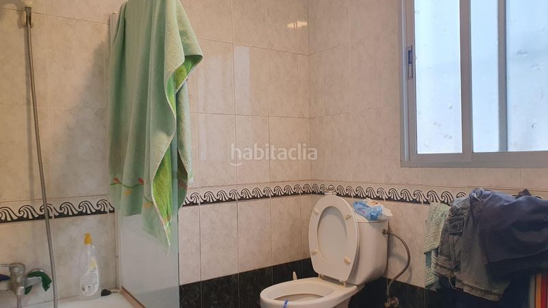 Foto b9c4633c-765f-420c-9eab-60977e30a53e. Casa adossada a Pilas