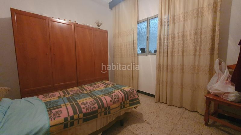 Foto c1e5154e-91dd-4a57-a1f6-0da1d57d49a3. Casa adossada a Pilas