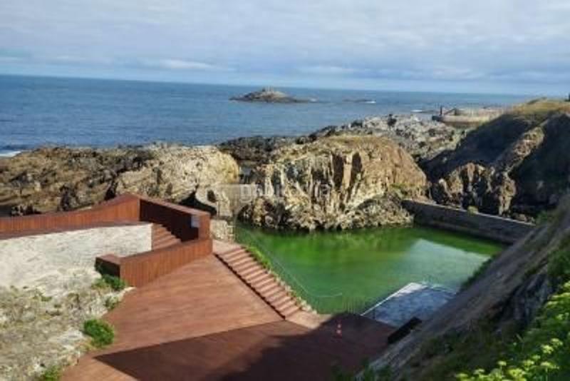 Foto d8dfa534-d4c1-4b3f-bbd7-c9a854302372. Casa con parcheggio in Tapia de Casariego