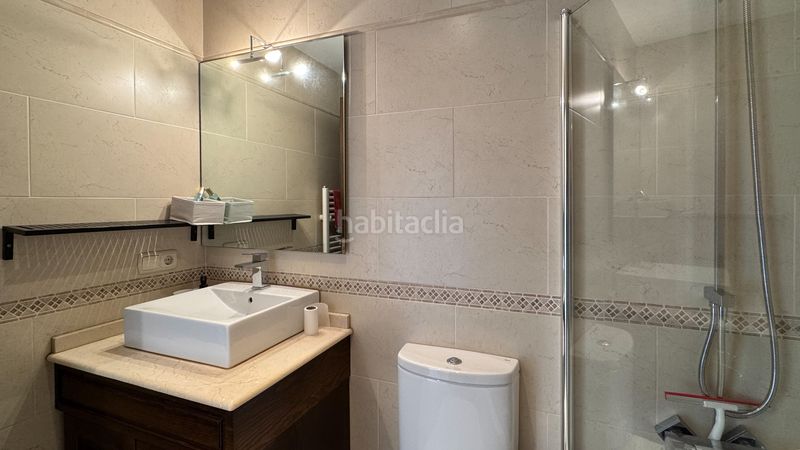 Foto bff2286a-d80e-48fa-94a5-210ff52da5bd. Pis amb xemeneia calefacció aparcament a Puigcerdà