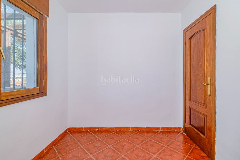 Foto cda1bade-5f4d-46a4-b9a7-8b38bc02b34b. Xalet amb xemeneia aparcament a San Francisco - El Chorrillo Gabias (Las)
