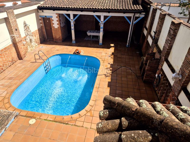 Foto 5d8eaeae-e15b-4c01-aa16-8bb343476f40. Chalet avec chauffage parking piscine dans San Bernabé Algeciras