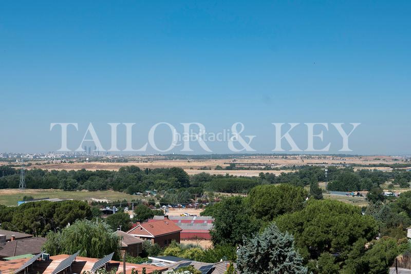 Foto 6bf6af61-5b52-4992-8a24-90c52a8e939c. Chalet avec chauffage parking piscine dans Altos de Jarama Paracuellos de Jarama