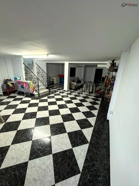 Foto 13120d0e-646d-4ad7-be49-0db123ea67fe. Casa adossada amb aparcament a Écija