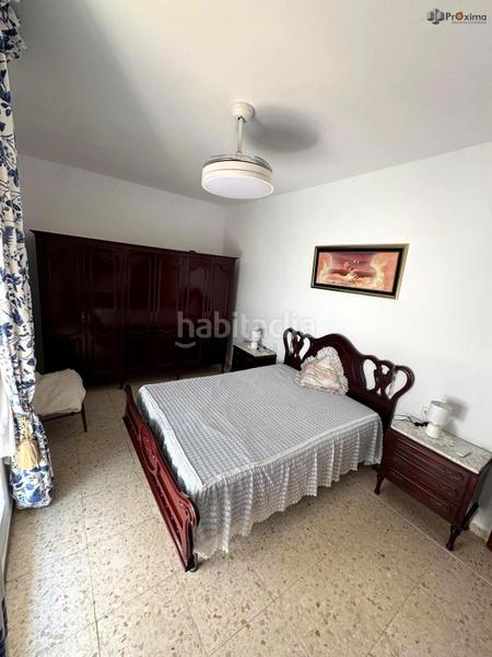 Foto 60213dd6-e0e4-49f0-8ac4-cd6be8124943. Casa adossada a Écija