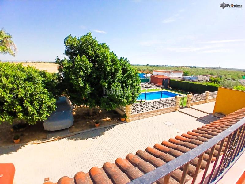 Foto bd8dba81-03c1-4c64-babf-51b8073c2e2c. Chalet  en los algarbes en Carlota (La)