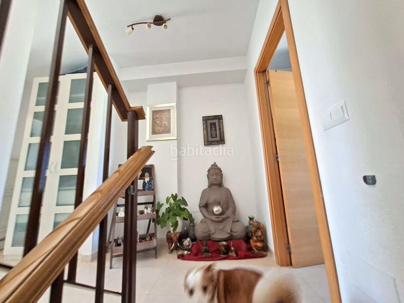 Foto 924a2823-6464-4ffd-bcb9-2f2537edc5b4. Casa adosada en Almayate Bajo