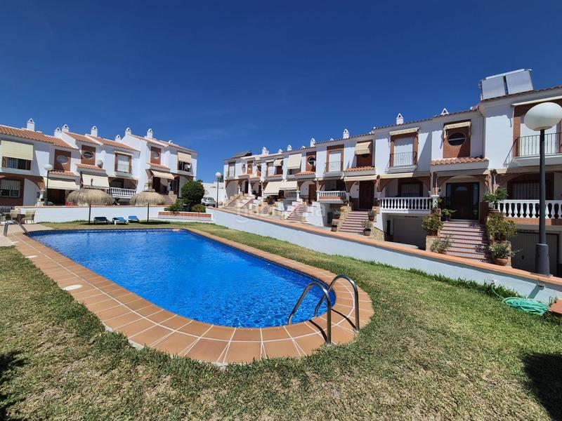 Foto 43cfac86-a79f-41b2-9d9d-3df9a25e8693. Reihenhaus mit parking pool in Almuñecar centro Almuñécar