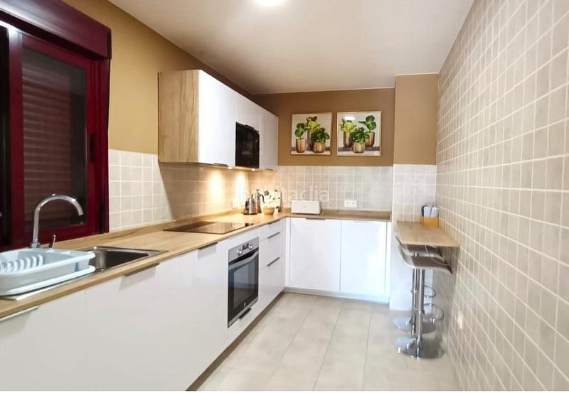 Foto b549ee3f-0fe1-4f5b-97e3-41564f4a408a. Appartamento con camino parcheggio piscina in La Duquesa Manilva