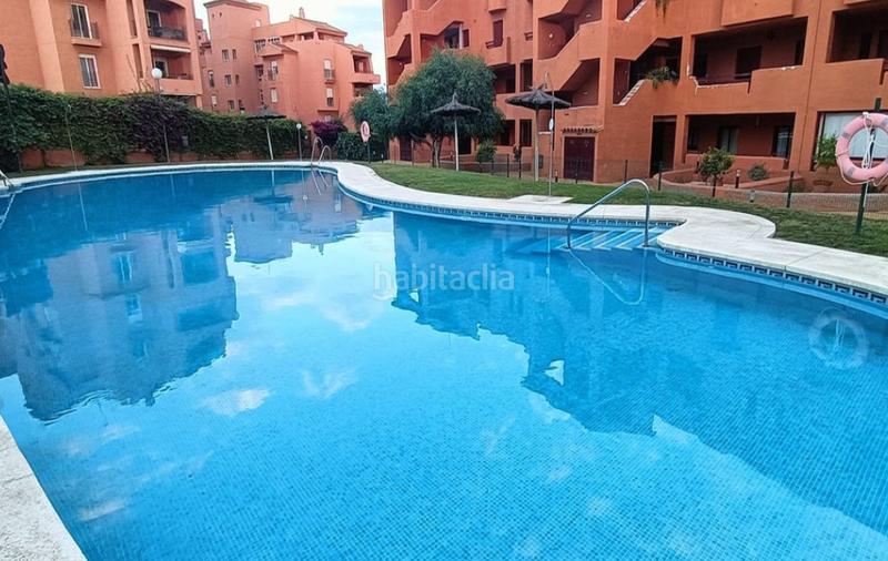 Foto c292f47a-8a0f-470a-a24b-2f5b79cc7196. Appartamento con camino parcheggio piscina in La Duquesa Manilva