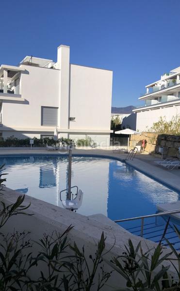 Foto b7e33958-eebf-42a2-a3ad-eeabababca47. Etagenwohnung mit kamin parking pool in Cancelada Estepona