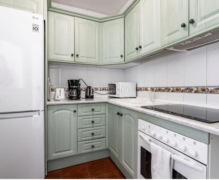 Foto 33974863-5ce8-43ec-803d-a0694eae35c9. Pis amb xemeneia piscina a Puerto Marina Benalmádena