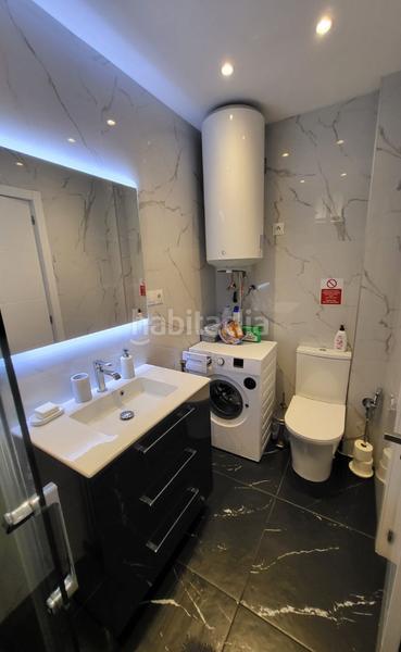 Foto d0268124-93c3-40dd-8757-669bd0fcd9bc. Flat with fireplace in Playa de los Boliches Fuengirola