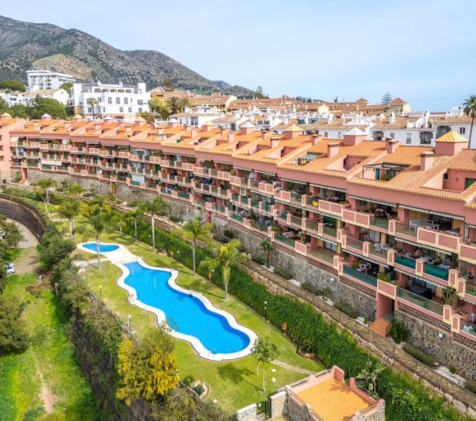 Foto 51f6e408-baf4-4b12-bfdc-12a7cdc54263. Appartamento con camino parcheggio piscina in Mijas pueblo Mijas