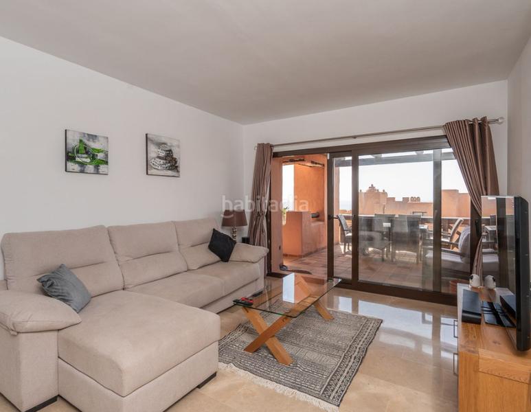 Foto 895aeca8-f23b-438d-b9c5-275f5703dd8b. Appartamento con camino parcheggio piscina in La Duquesa Manilva