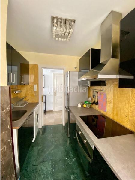 Foto 165728ed-23b2-4db8-beb0-abde168f1ebf. Appartement avec cheminée parking piscine dans puerto de Estepona Estepona