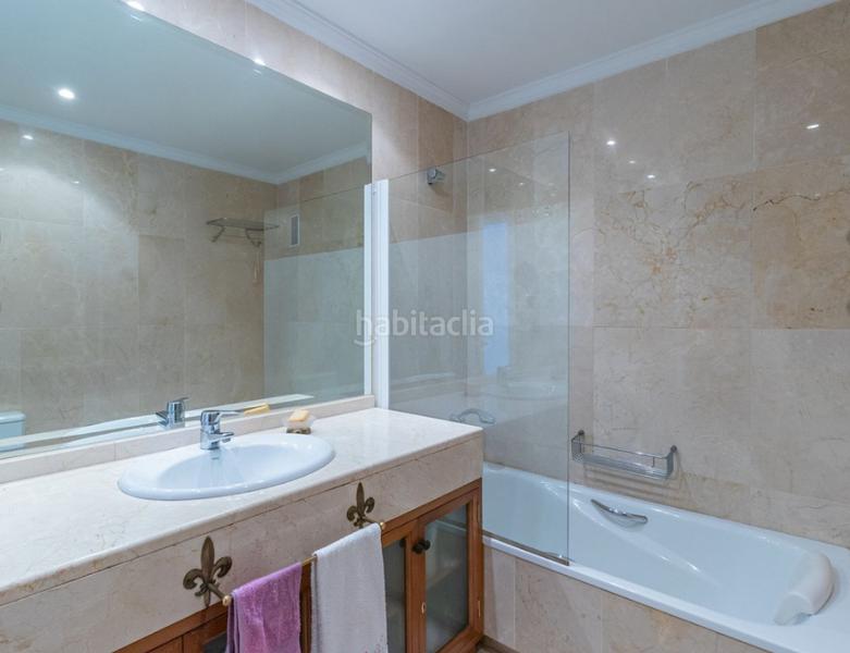 Foto c3cb5f3c-13e9-4e82-822d-2b52a2513296. Appartamento con camino parcheggio piscina in Puerto Banús Marbella