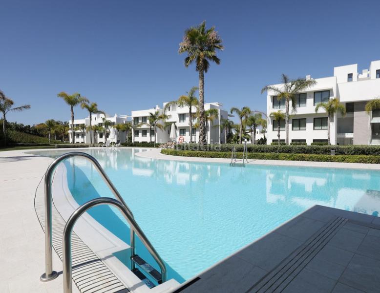 Foto 15b70014-bafd-40aa-9ab9-d520f87413aa. Appartamento con camino parcheggio piscina in Nueva Atalaya Estepona