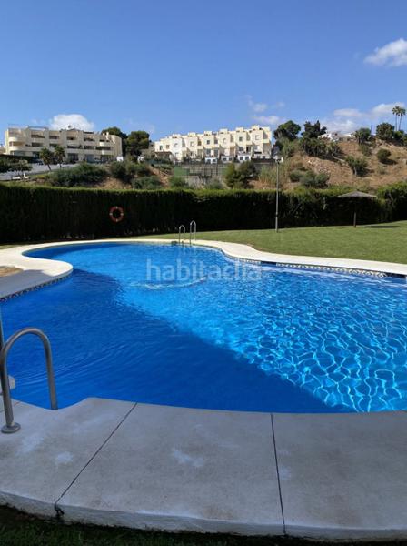 Foto a162825a-01b4-416c-af65-afdb64e8b470. Pis amb xemeneia aparcament piscina a Las Gaviotas - Carvajal Fuengirola