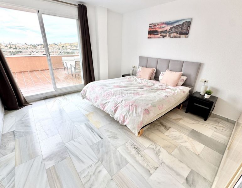 Foto 9206fd27-6ba9-4ad4-ac45-b53b5f9c4a5e. Piso costa en El Faro de Calaburra - Chaparral Mijas