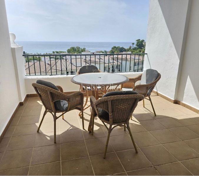 Foto 563df286-3b86-49c1-ab8d-896521970ac9. Pis amb xemeneia aparcament piscina a la cala Mijas Mijas