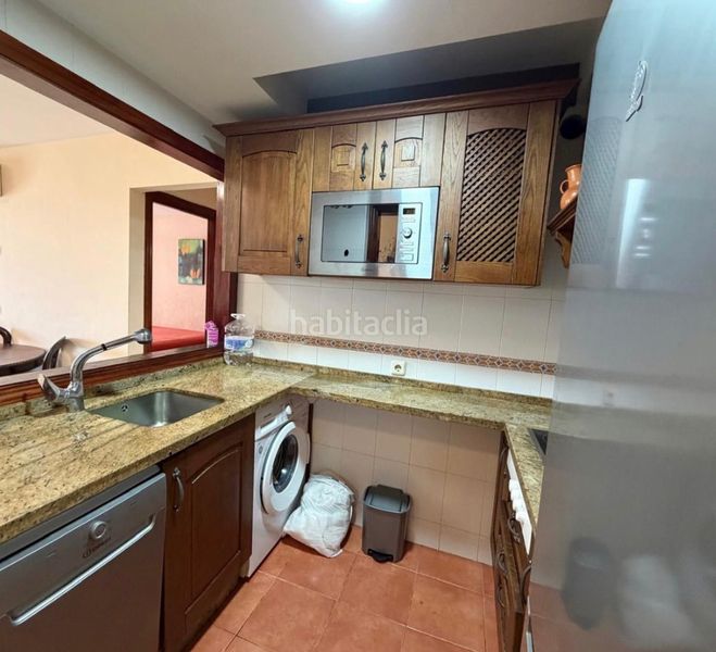 Foto c117a7ad-d015-4ce7-be62-8b8701e89dc6. Pis amb xemeneia aparcament a Solymar Benalmádena