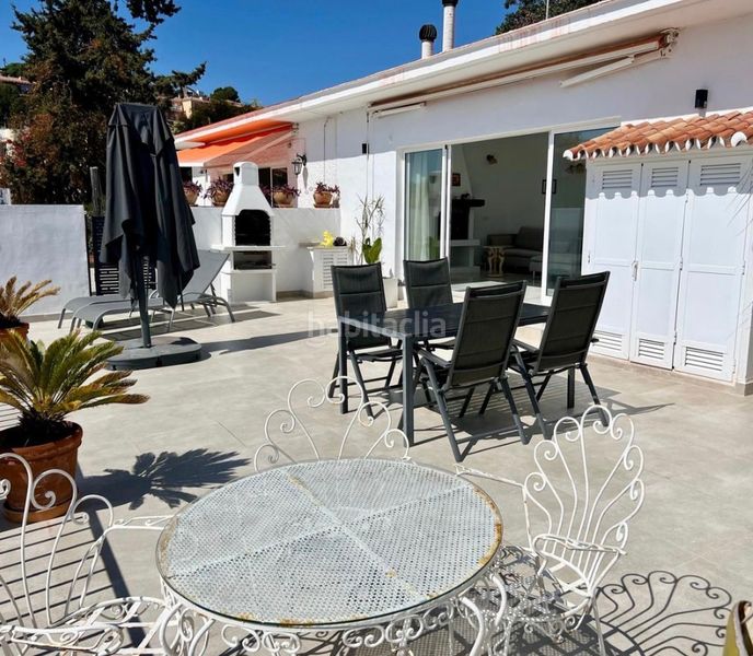 Foto 351f7db4-c746-497d-8948-062fbad4c077. Casa amb xemeneia aparcament a Torreblanca del Sol Fuengirola