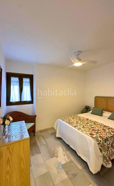 Foto 04c33f1f-a5ad-4bba-b488-e8b07ee56381. Pis amb xemeneia aparcament a Puerto Marina Benalmádena