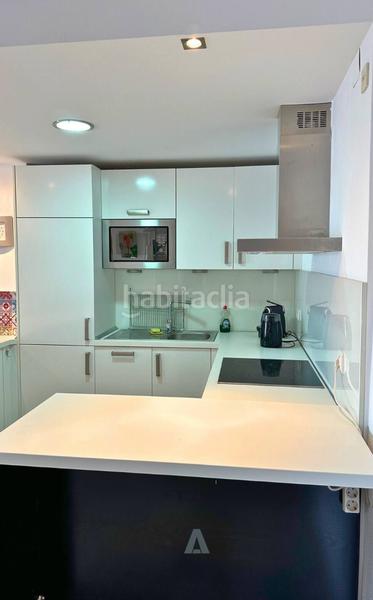 Foto 2f5f16f3-9518-470b-b7f4-11d61496215a. Pis amb xemeneia aparcament a Puerto Marina Benalmádena