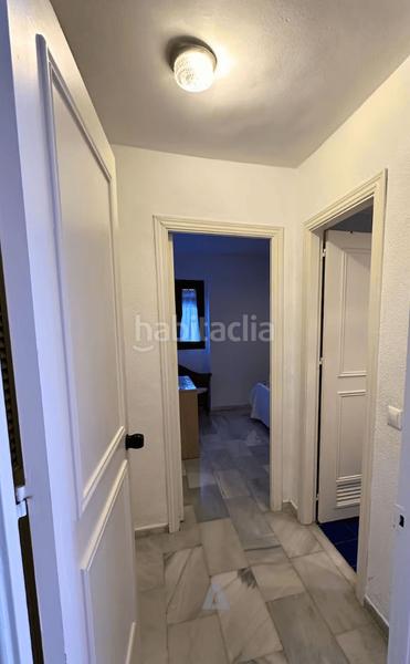 Foto bc4c4bcf-d39d-4b4f-adba-eb0427a610f4. Pis amb xemeneia aparcament a Puerto Marina Benalmádena