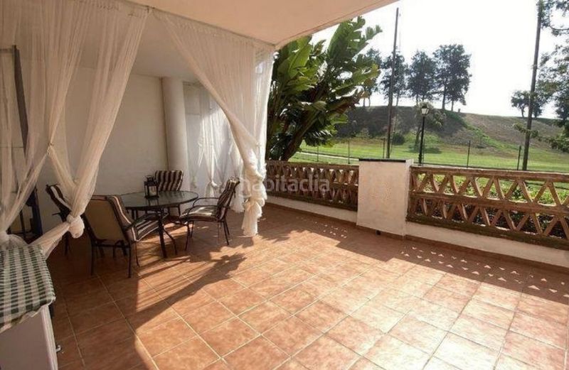 Foto 89db95b8-a7d3-4c21-a5b8-4455b69d9019. Pis amb xemeneia aparcament piscina a Riviera del Sol Mijas