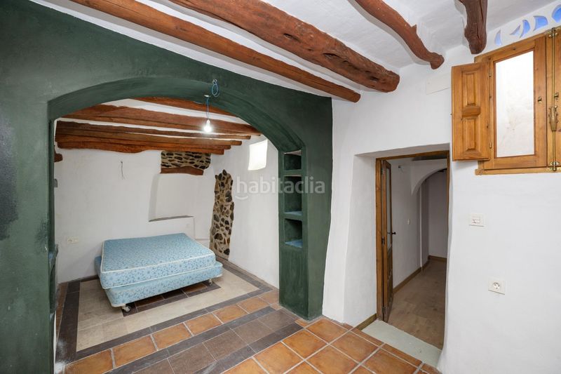 Foto 0f583d96-3b8b-4f81-8477-64e229eca544. Casa adossada a Torvizcón