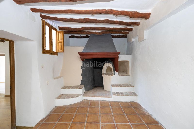 Foto 4c782a55-f494-49e9-bbd5-18836e2d53e6. Casa adossada a Torvizcón