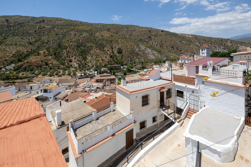 Foto ed6ed37f-4a7a-4fdb-8cf1-f5aebbc61e0a. Casa adossada a Torvizcón