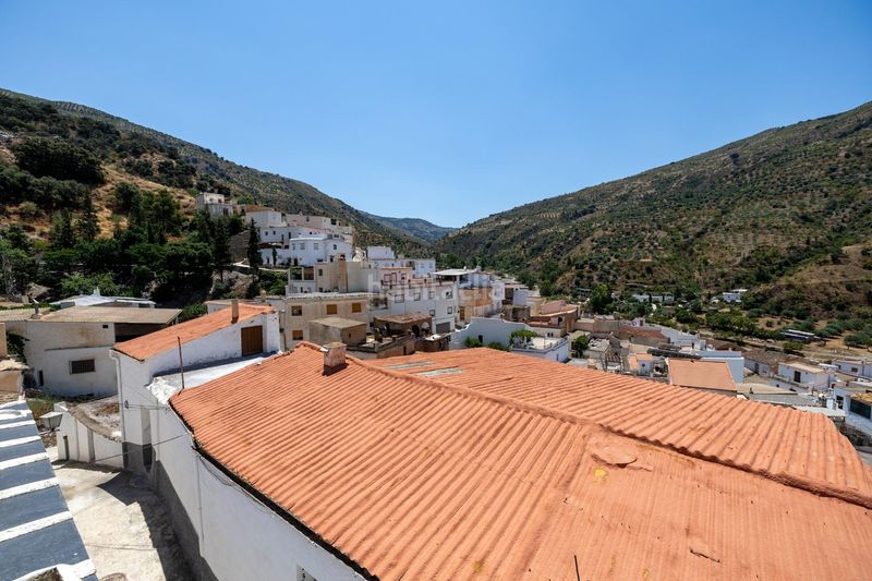Foto eeaccdfa-204e-44ac-bdd2-3e8dd6b23f41. Casa adossada a Torvizcón