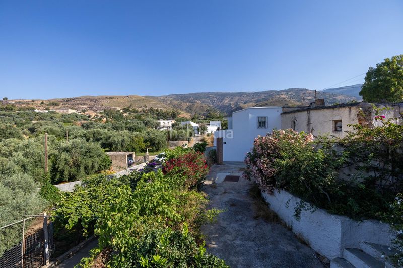 Foto 4e7c3c88-f95d-4129-8191-540fca783fc4. Casa amb aparcament a Órgiva