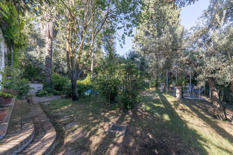 Foto f1ecb20b-d086-413a-8b48-4e88ef0fdbfe. Chalet magnifico chalet con amplios jardines y piscina en cortijo del aire! en Albolote