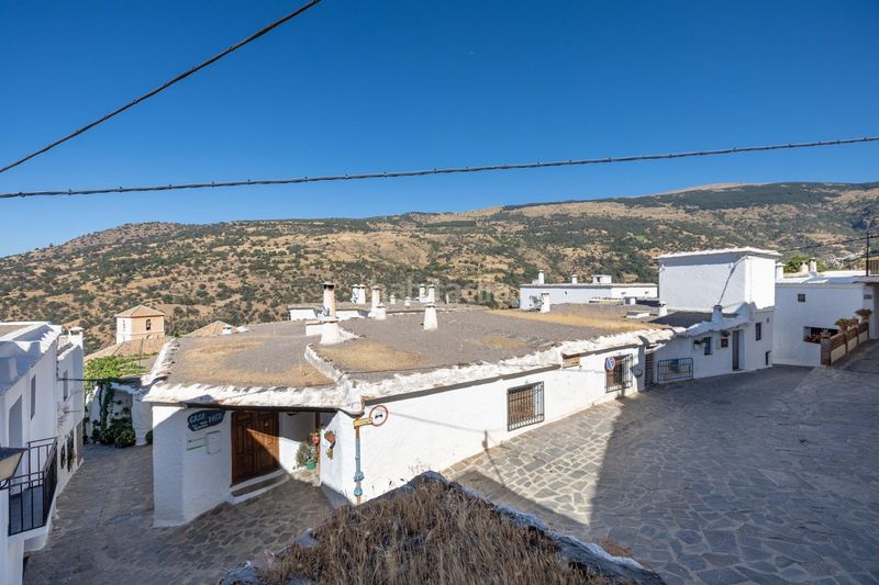 Foto 137ae5b7-0c49-49af-b0b1-57a3de8ddda9. Casa adossada a Bubión