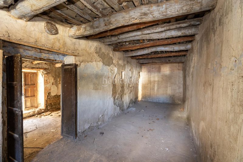 Foto b9f0b0b8-7d48-4683-80d9-f94efddeb383. Casa adossada a Bubión