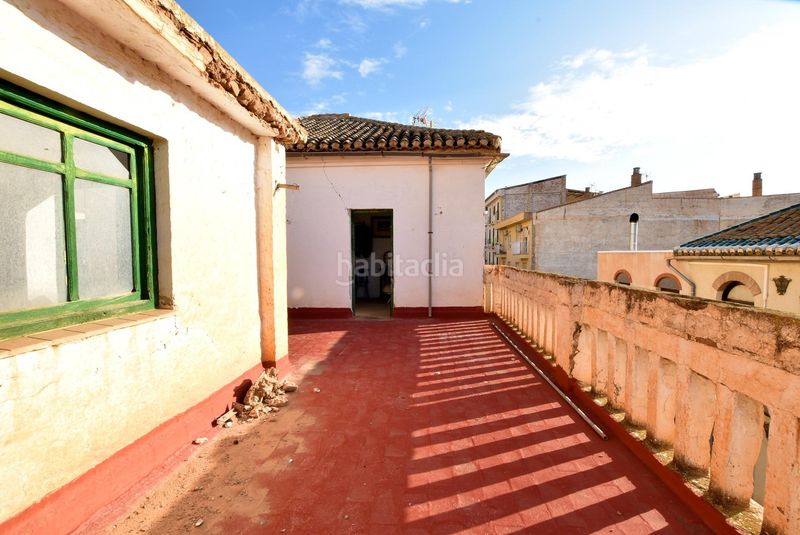 Foto 27436424-a1a7-4d6f-a61a-941066b7698e. Casa adossada a Lanjarón