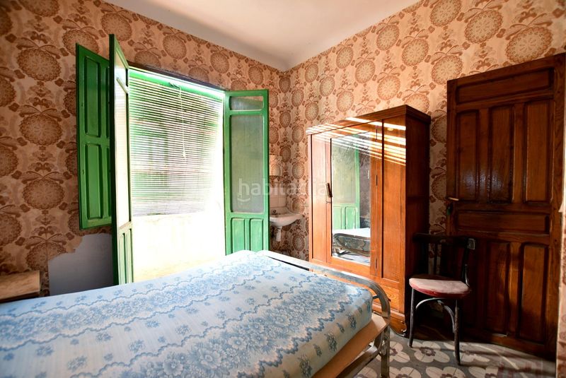 Foto 5f0944b6-b6f1-46b6-8d77-0acb006a0e0d. Casa adossada a Lanjarón