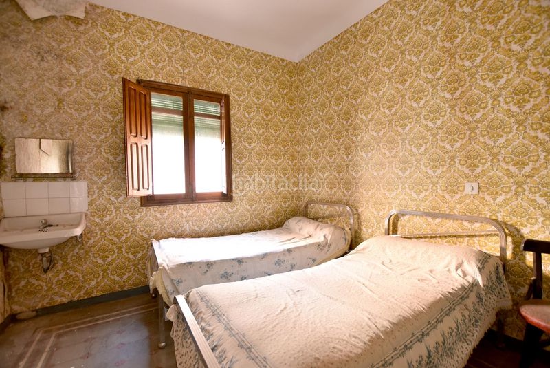 Foto edab49ad-d47f-4b06-a267-b65c59b7d054. Casa adossada a Lanjarón
