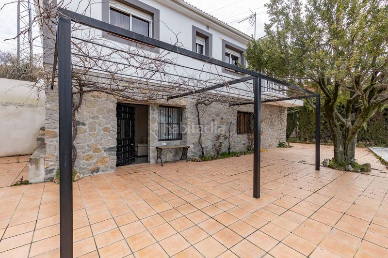 Foto 271a1992-edce-4597-bd82-2093dec9c4e3. Casa amb calefacció piscina a Huétor de Santillán
