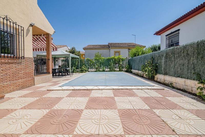 Foto 4af264fc-20f9-44e6-90b3-395912f6695c. Chalet  en venta en urbanizaciones, 5 dormitorios. en Cúllar Vega
