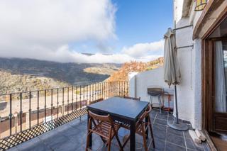 Piccolo appartamento  Calle de la carretera 58. Apartamento con terraza y vistas en bubión