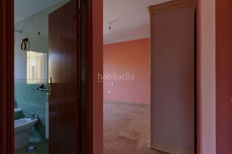 Foto 8547b5b5-b1f3-4c39-93b9-c2ccaf8bbf03. Casa aparellada amb calefacció aparcament a Ogíjares