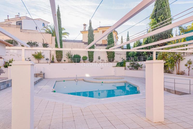 Foto 68095318-ea15-4e1f-974b-10b97b79a4a9. Pis amb aparcament piscina a Cenes de la Vega