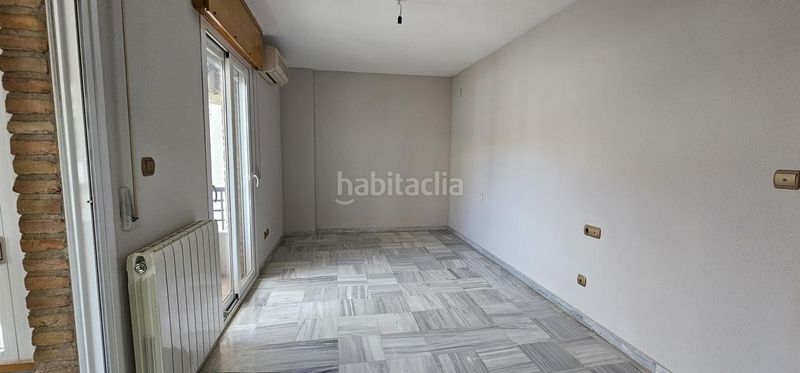 Foto a47ced25-4885-4445-80de-e93fb22cf86b. Casa adossada amb calefacció aparcament a Maracena