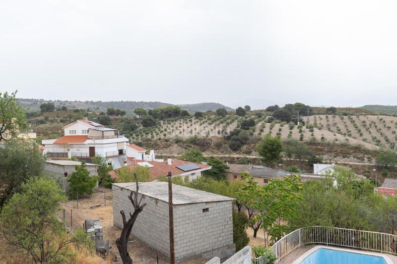 Foto 794bedbb-c4f2-45aa-8e3b-f6cd713c266d. Chalet en camino de la barrera (far) 58 el Fargue 2000 metros de parcela segregable con chalet de 178m en tres plantas mas nave de 90 metros en Granada